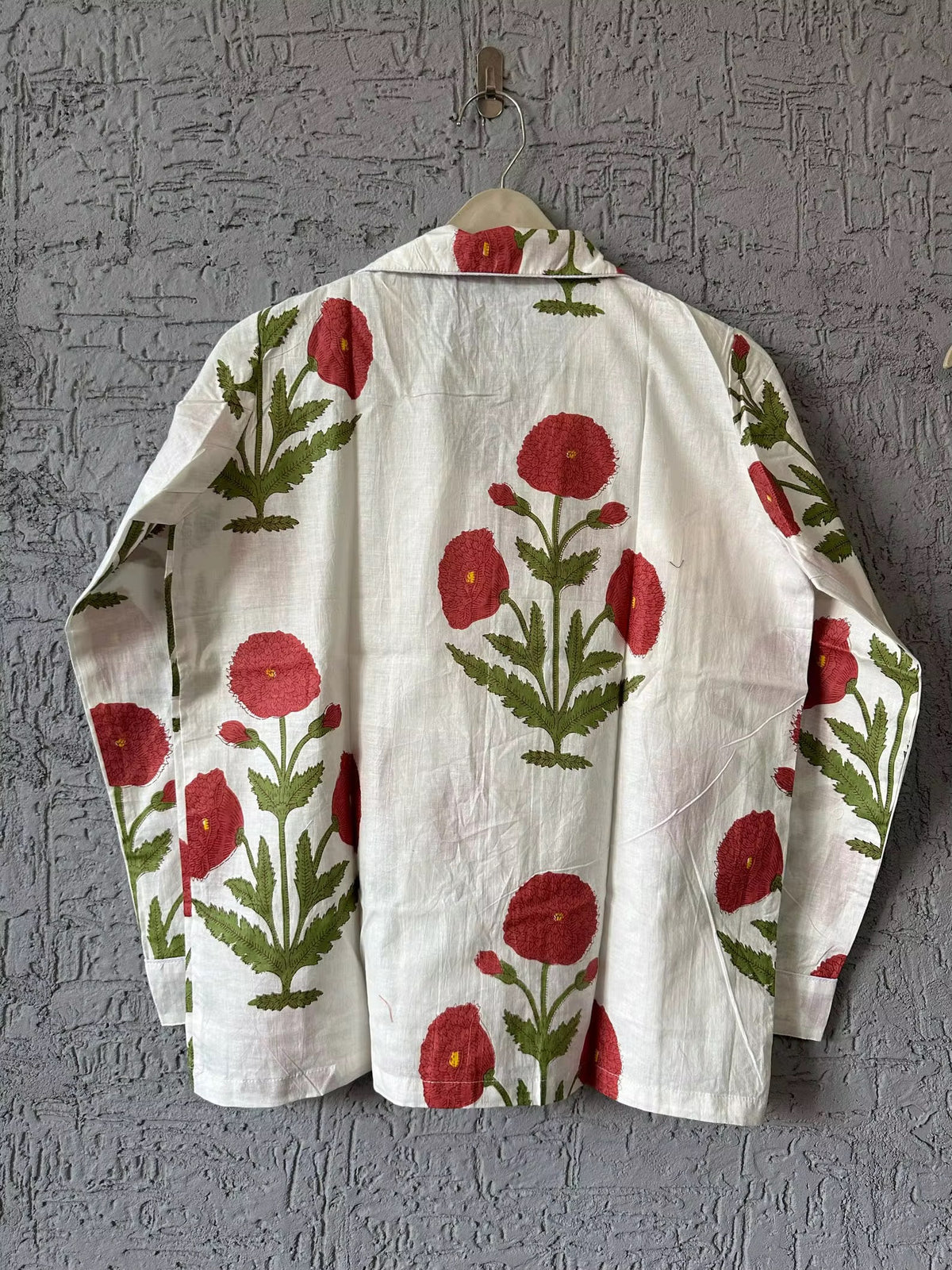 Pijama flores rojas
