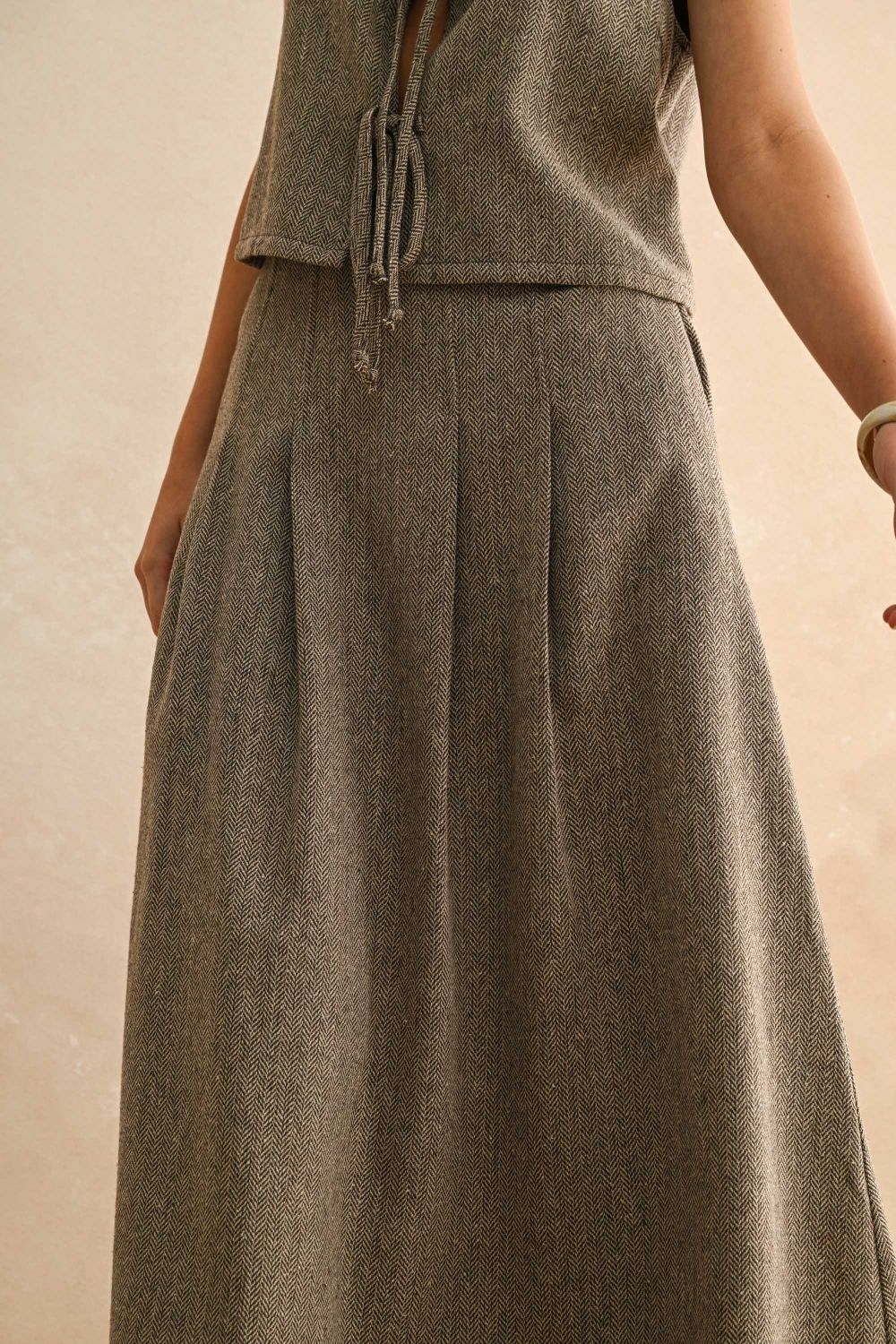 Falda plisada espiga