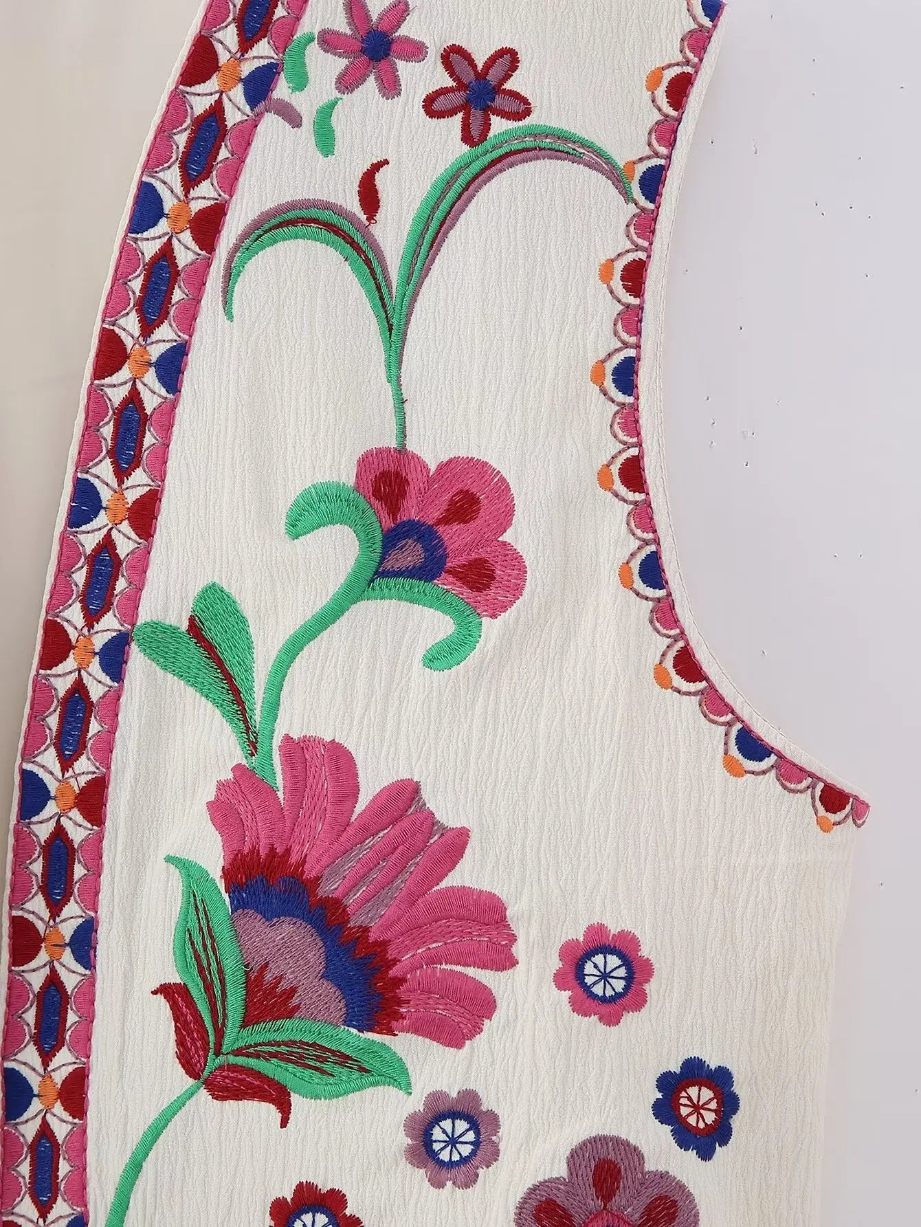 Chaleco flores rosa
