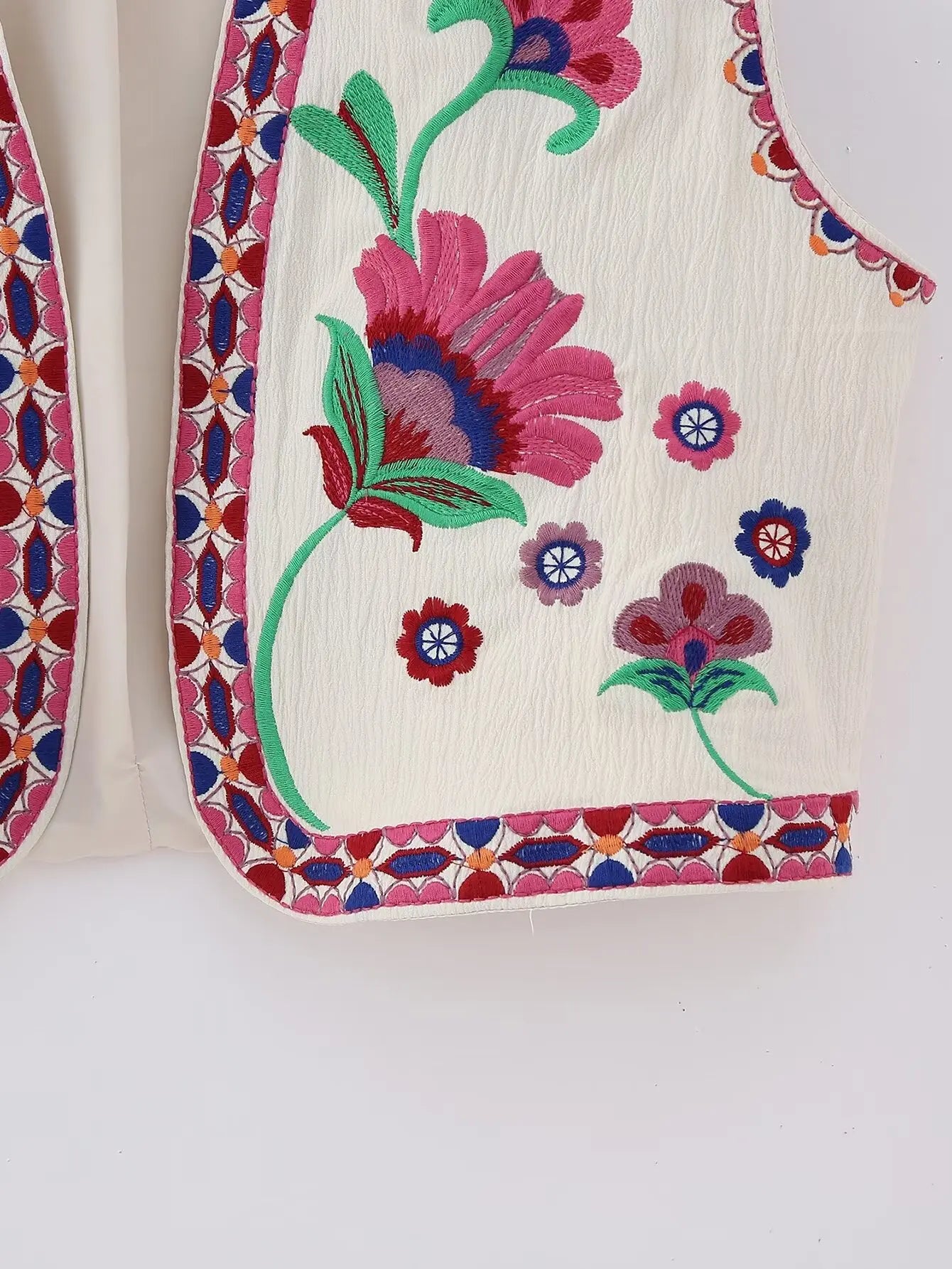 Chaleco flores rosa